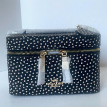 Load image into Gallery viewer, Navy blue jewelry box with white polka dots and gold zipper, featuring Coach logo.