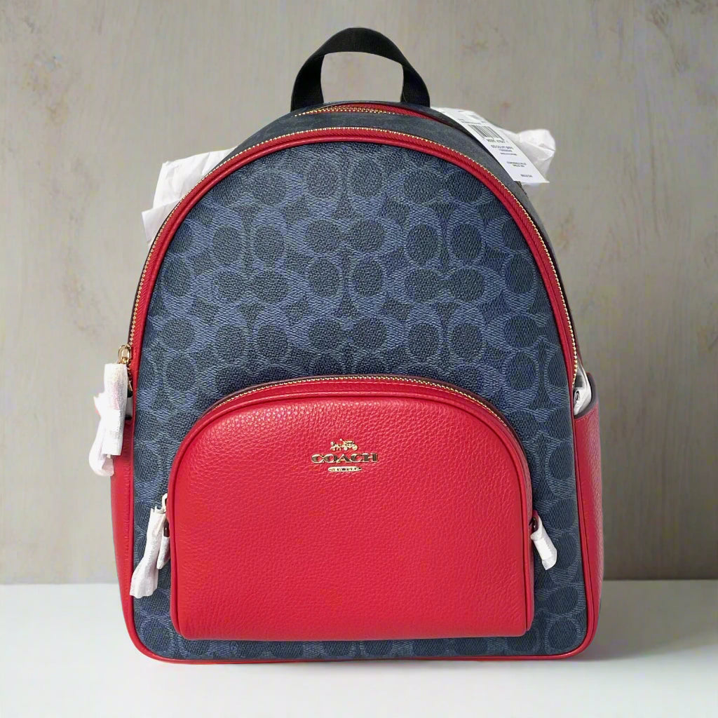 Red and blue backpack with visible brand logo on a white background