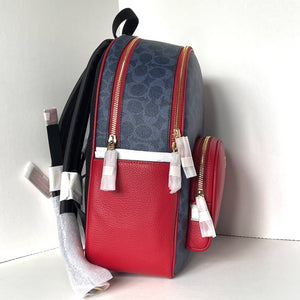 Backpack with red and blue design on a white background