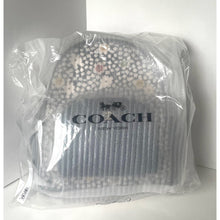 Load image into Gallery viewer, Coach backpack in clear plastic packaging on a white background