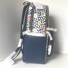 Load image into Gallery viewer, Blue backpack with floral pattern on a white background
