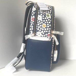 Blue backpack with floral pattern on a white background