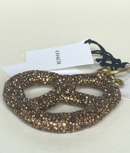 Load image into Gallery viewer, Coach keychain with rhinestone design on a light background