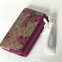 Load image into Gallery viewer, Coach Double Zip Phone Wallet Red Bow Signature Canvas Wristlet CAA84