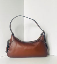 Load image into Gallery viewer, Brown leather handbag with black handle and strap on a white background