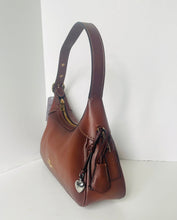 Load image into Gallery viewer, Brown leather handbag with a drawstring on a white background