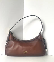 Load image into Gallery viewer, Brown Coach handbag on a white background