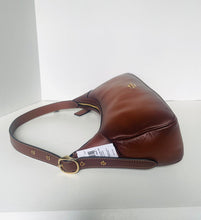 Load image into Gallery viewer, Brown leather bag with a strap on a white background
