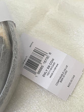 Load image into Gallery viewer, A close-up of a white product tag attached to a rolled gray fabric item, placed on a textured white surface. The tag shows a barcode and printed text including 'EMU SB COW', 'MADE IN VIETNAM', and '$40.