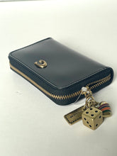 Load image into Gallery viewer, Navy blue wallet with gold zipper and dice charm on a white background