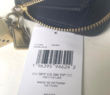 Load image into Gallery viewer, Product tag with barcode and text on a white surface
