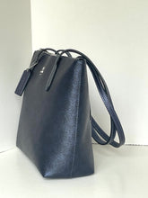 Load image into Gallery viewer, A dark navy blue pebbled leather tote bag with a single shoulder strap, shown standing upright against a plain white background.