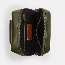 Load image into Gallery viewer, Green leather pouch with a brown strap on a white background