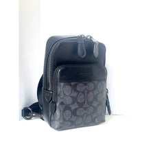 Load image into Gallery viewer, Black and gray crossbody bag with Coach logo on a white background