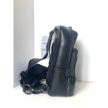 Load image into Gallery viewer, Black leather bag with a strap on a white background