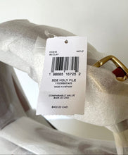 Load image into Gallery viewer, Product tag on a white surface with a blurred background