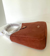 Load image into Gallery viewer, Brown suede handbag with a visible brand logo on a white surface.