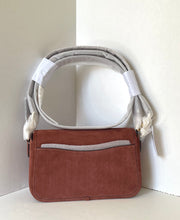 Load image into Gallery viewer, Brown leather handbag with a strap on a white background