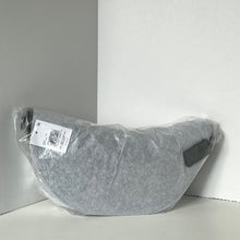 Load image into Gallery viewer, Gray cushion in packaging on a white surface with a gray wall background