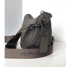 Load image into Gallery viewer, Gray handbag with a visible brand tag on a white background