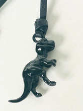 Load image into Gallery viewer, Black dinosaur pendant on a white background