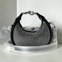 Load image into Gallery viewer, Black handbag with silver studs on a white background