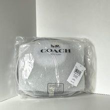 Load image into Gallery viewer, Coach pouch in clear packaging on a white background