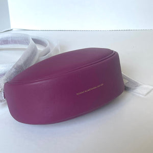 Purple sunglasses case with gold text on a white background