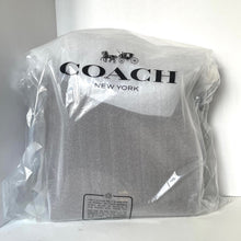 Load image into Gallery viewer, Coach New York backpack in clear plastic packaging on a white background