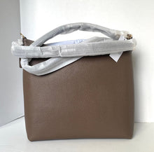 Load image into Gallery viewer, Brown leather handbag with a gray interior liner on a white background