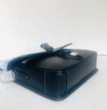 Load image into Gallery viewer, A black leather shoulder bag with a flap closure and silver buckle, shown on a plain white background.