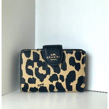 Load image into Gallery viewer, Leopard print wallet with Coach logo on a white background