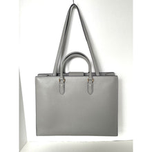 Load image into Gallery viewer, Gray handbag with a strap on a white background