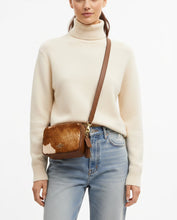 Load image into Gallery viewer, Mannequin wearing a brown leather crossbody bag on a white background