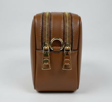 Load image into Gallery viewer, Brown leather bag with gold zippers on a white background