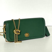 Load image into Gallery viewer, Green handbag with gold chain and hardware on a white background