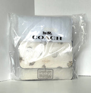 Coach New York product in clear packaging on a white background