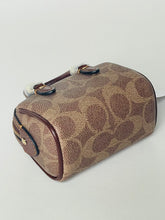 Load image into Gallery viewer, Patterned handbag on a light gray background