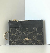 Load image into Gallery viewer, Black Coach wallet with gold accents on a white background