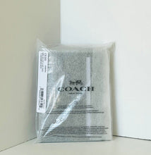 Load image into Gallery viewer, Coach product packaging on a white background
