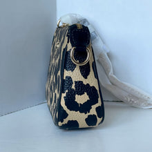 Load image into Gallery viewer, Leopard print handbag with gold accents on a white background