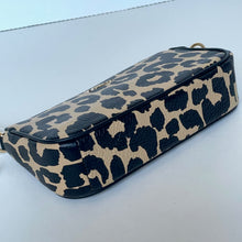 Load image into Gallery viewer, Leopard print handbag on a light blue background