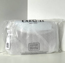 Load image into Gallery viewer, Coach pouch in clear packaging on a white background