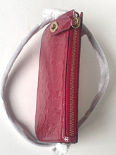 Load image into Gallery viewer, Pink textured handbag with gold zipper on a white background