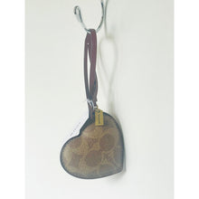 Load image into Gallery viewer, Heart-shaped leather keychain with a tag on a white background