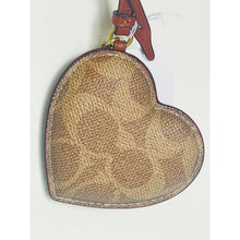 Load image into Gallery viewer, Heart-shaped brown textured keychain with a strap on a white background