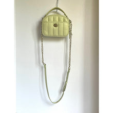 Load image into Gallery viewer, Light green quilted handbag with chain strap on a white background
