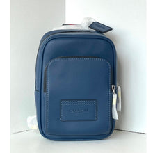 Load image into Gallery viewer, Blue Coach pouch on a white background