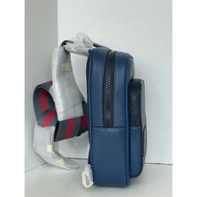 Load image into Gallery viewer, Blue backpack with gray and red strap on a white background