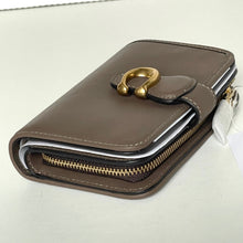 Load image into Gallery viewer, Brown leather wallet with gold zipper and clasp on a white background